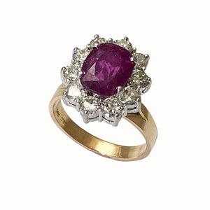 Contemporary 14ct. Yellow and white gold, ruby and diamond cluster