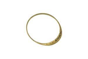 Contemporary 18ct. Yellow gold and sapphire bangle by Dorothy Erickson | Bespoke Jewellery Designers Melbourne