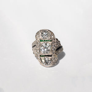 diamond and emerald-plaquering engagement