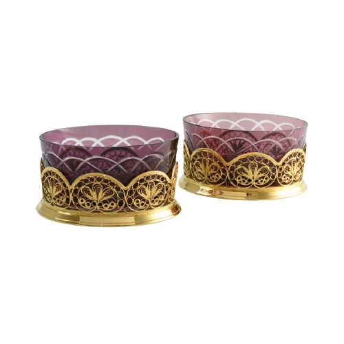 A pair of Russian gilded wine coasters.