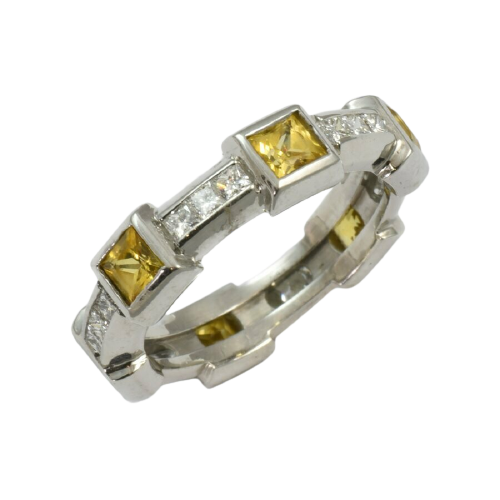 Contempoary 18ct White, Yellow sapphire and diamond ring.