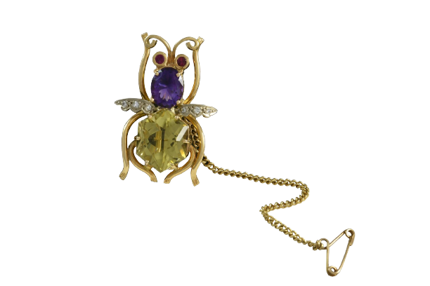 A contemporary 18ct. Yellow gold beetle brooch