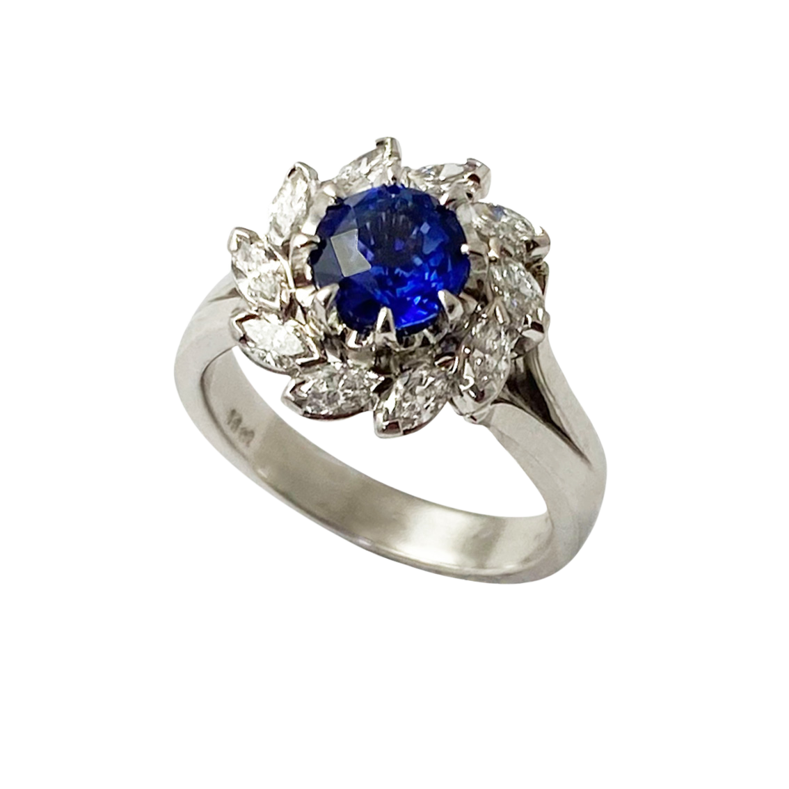 18ct. White gold Sapphire and Diamond cluster ring